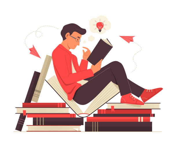 man reading a book and thinking